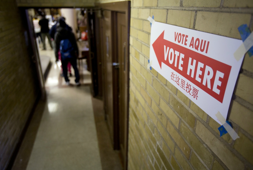 Voters enter the John Bailey Room at St. Francis Xavier Church in Washington Nov. 8, 2016. (CNS/Tyler Orsburn)