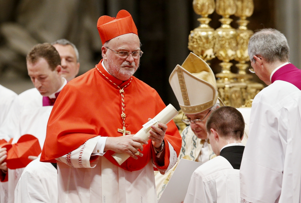 Cardinal Anders Arborelius of Stockholm carries his scroll after being made a cardinal by Pope Francis during a consistory in St. Peter's Basilica at the Vatican June 28. (CNS/Paul Haring)