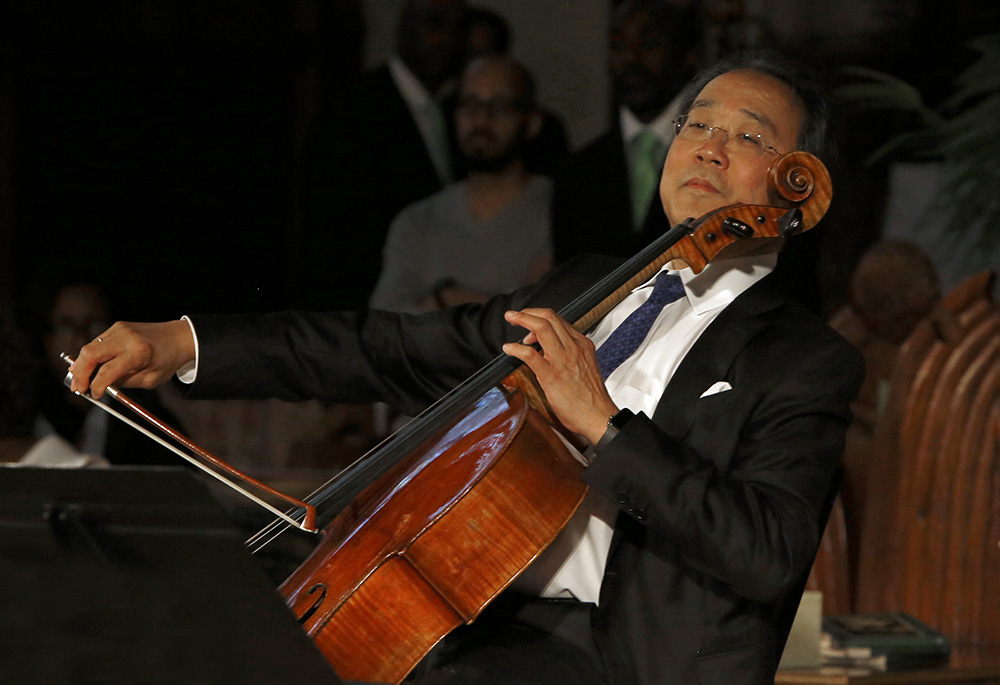 Yo-Yo Ma, world-renowned cellist, performs during the Concert for Peace at St. Sabina Church June 10, 2018, in Chicago. (CNS/Chicago Catholic/Karen Callaway)