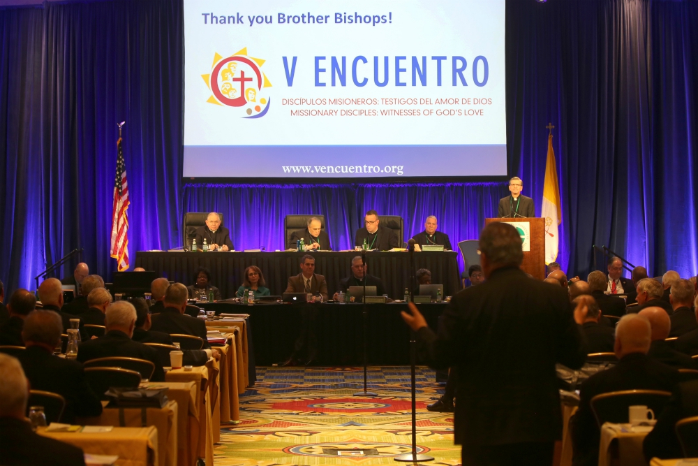 San Antonio Archbishop Gustavo García-Siller, at podium, listens to a question as he gives a report on V Encuentro at the 2018 fall general assembly of the U.S. Conference of Catholic Bishops in Baltimore. (CNS/Bob Roller)