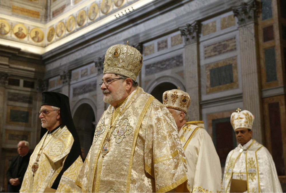 Bishop John Michael Botean, center, and other bishops of the Eastern Catholic churches in the U.S. arrive at the Basilica of St. Paul Outside the Walls in Rome Feb. 17. (CNS/Paul Haring)