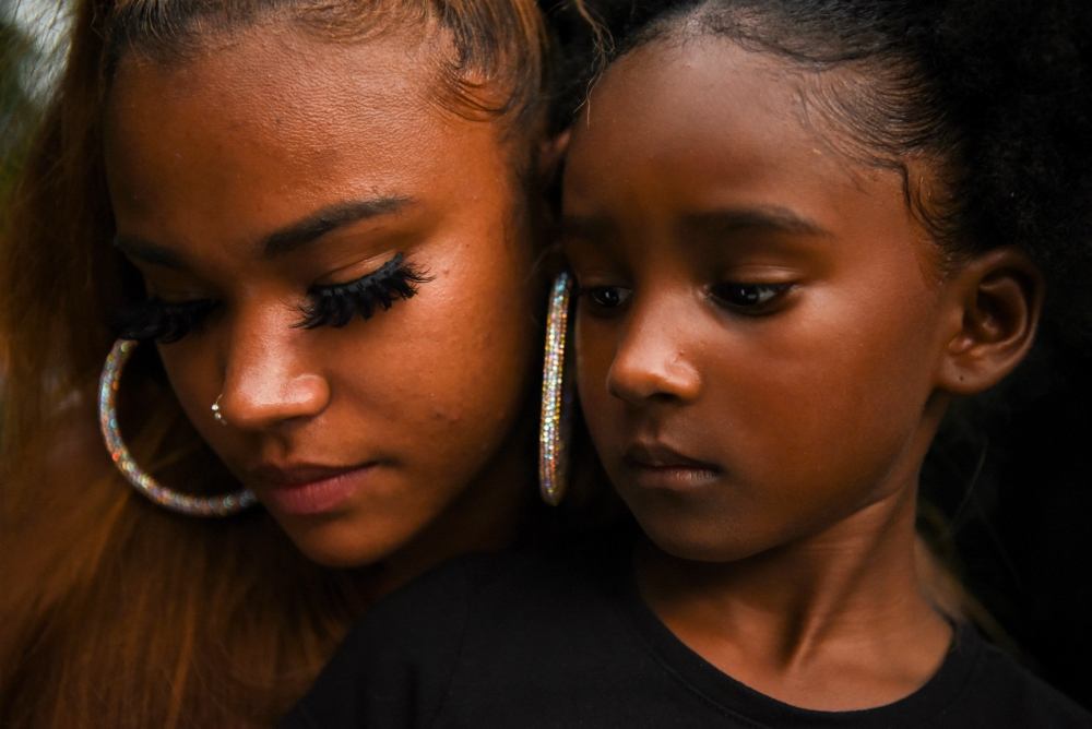 People are seen in Houston June 19. The date, known as Juneteenth, honors the end to slavery in the United States and is considered the longest-running African American holiday. (CNS/Reuters/Callaghan O'Hare)