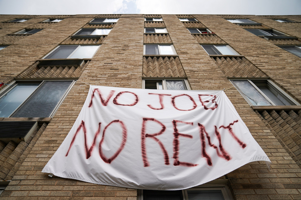 Residents in Washington push for the cancellation of rent Aug. 20, 2020, during the coronavirus pandemic.