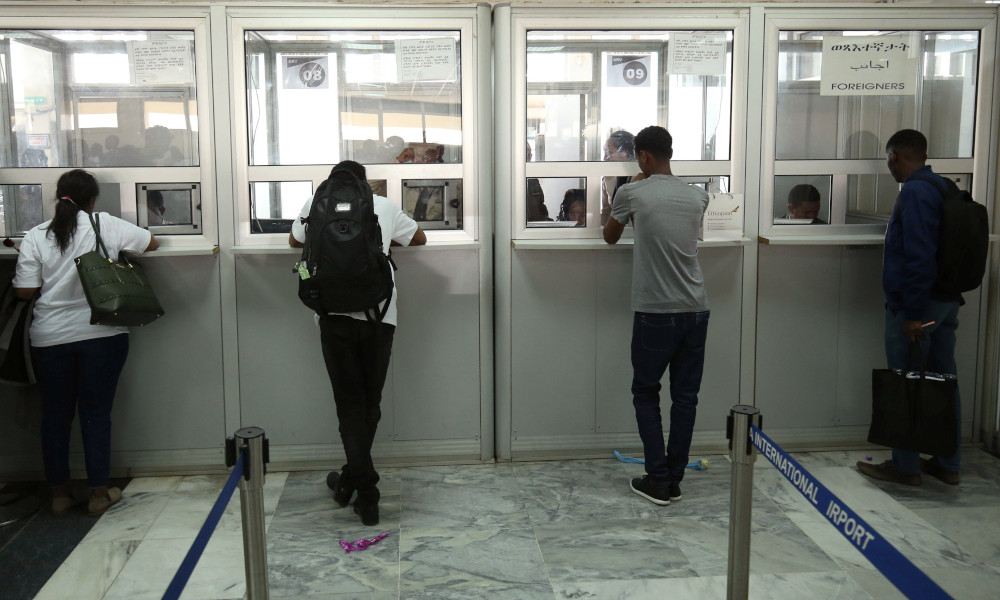 Passengers are processed at the immigration section after arriving at Asmara International Airport in Asmara, Eritrea, July 18, 2018. Eritrean authorities are continuing to detain Catholic Bishop Fikremariam Hagos Tsalim of Segheneity, who was arrested at the airport Oct. 15, 2022. (CNS photo/Tiksa Negeri, Reuters)