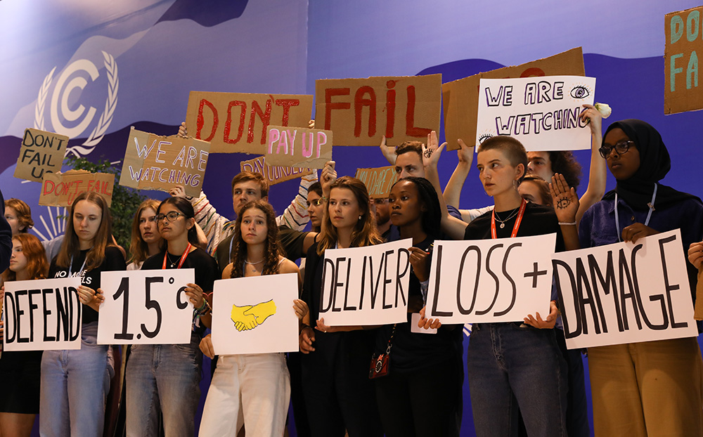 Young activists demonstrate at COP27 in Sharm el-Sheikh, Egypt, Nov. 19. (Flickr/UNclimatechange)