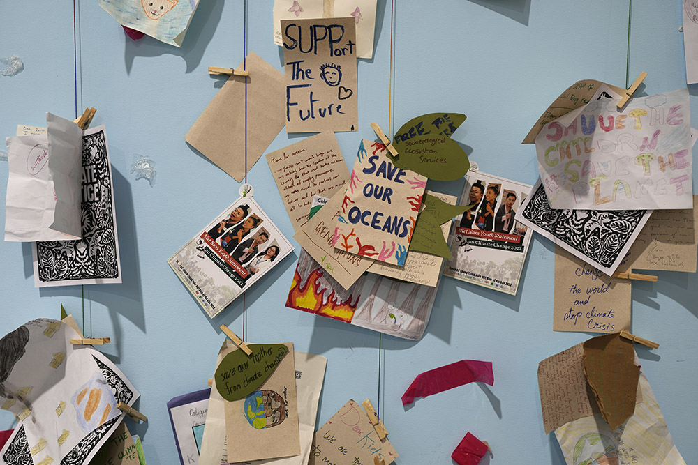 Letters and drawings are displayed at the COP27 U.N. climate summit Nov. 19 in Sharm el-Sheikh, Egypt. (AP/Peter Dejong)