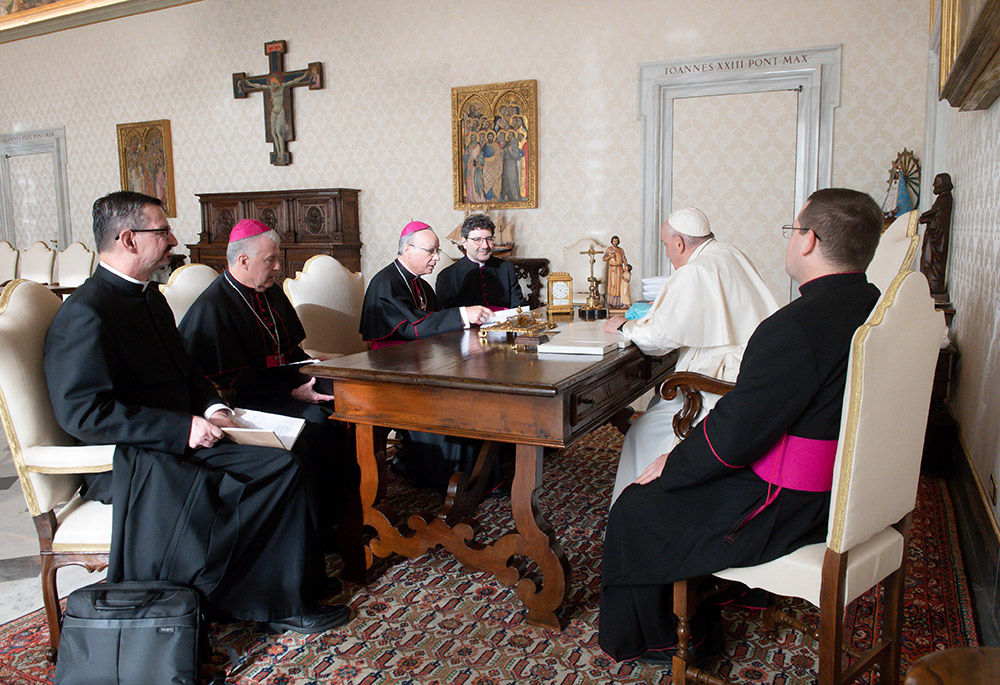 Pope Francis is pictured with officers of the Canadian bishops' conference during a meeting Dec. 9, 2021, at the Vatican. (CNS/Vatican Media)