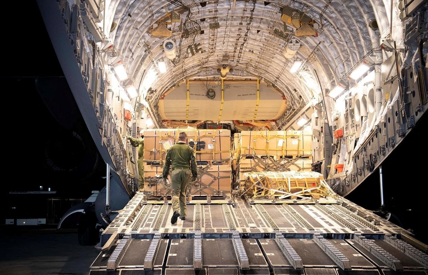 Canada's military aid is unloaded from a C17 Globemaster III plane at the international airport outside Lviv, in this handout picture released Feb. 20, 2022. (CNS photo/Press Service of the Ukrainian Armed Forces General Staff via Reuters)