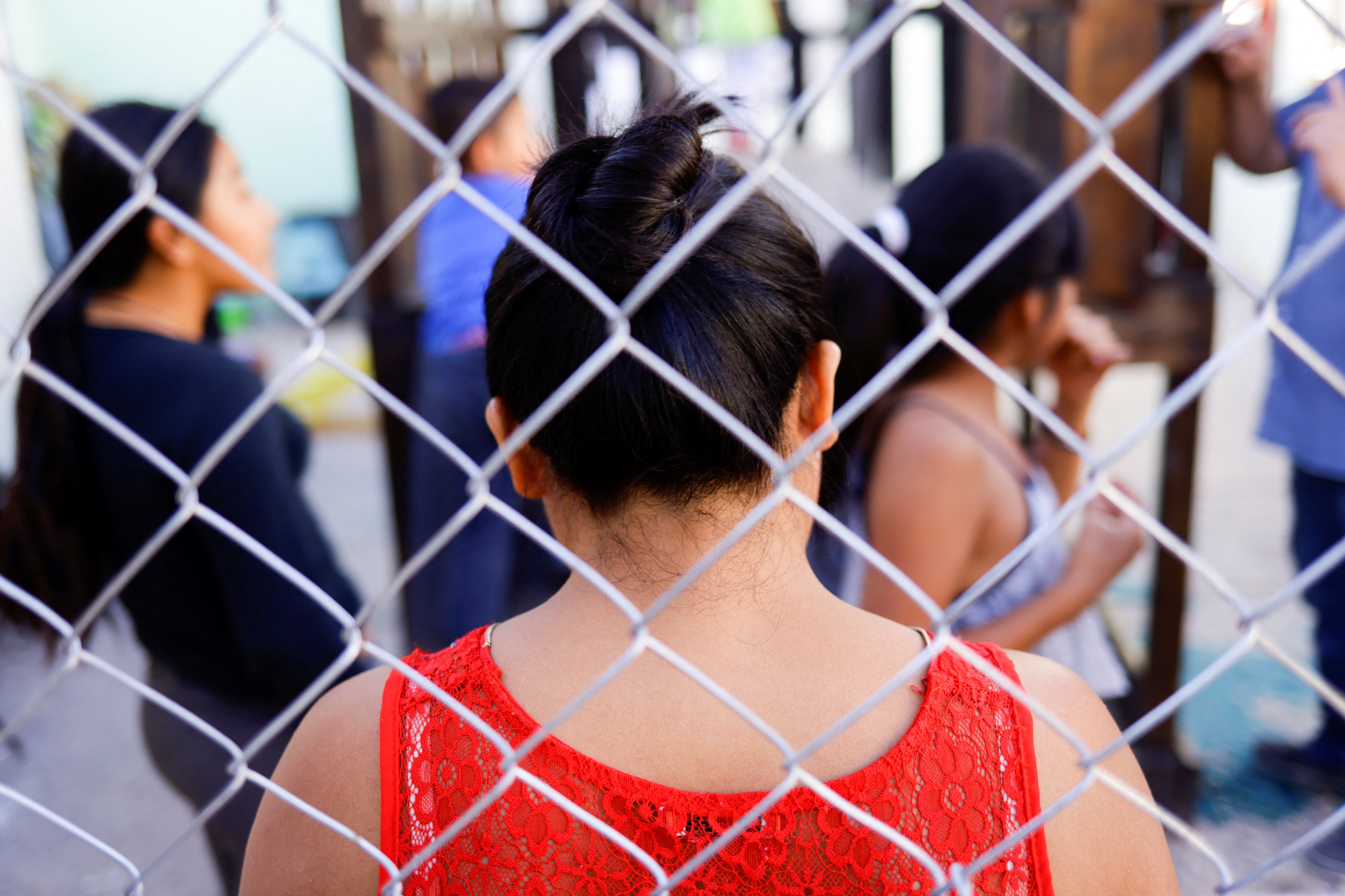 Migrants from Central America, who were returned to Mexico under Title 42 after seeking asylum in the U.S., stand inside the El Buen Samaritano shelter in Ciudad Juarez, Mexico, April 21, 2022. (CNS photo/Jose Luis Gonzalez, Reuters)