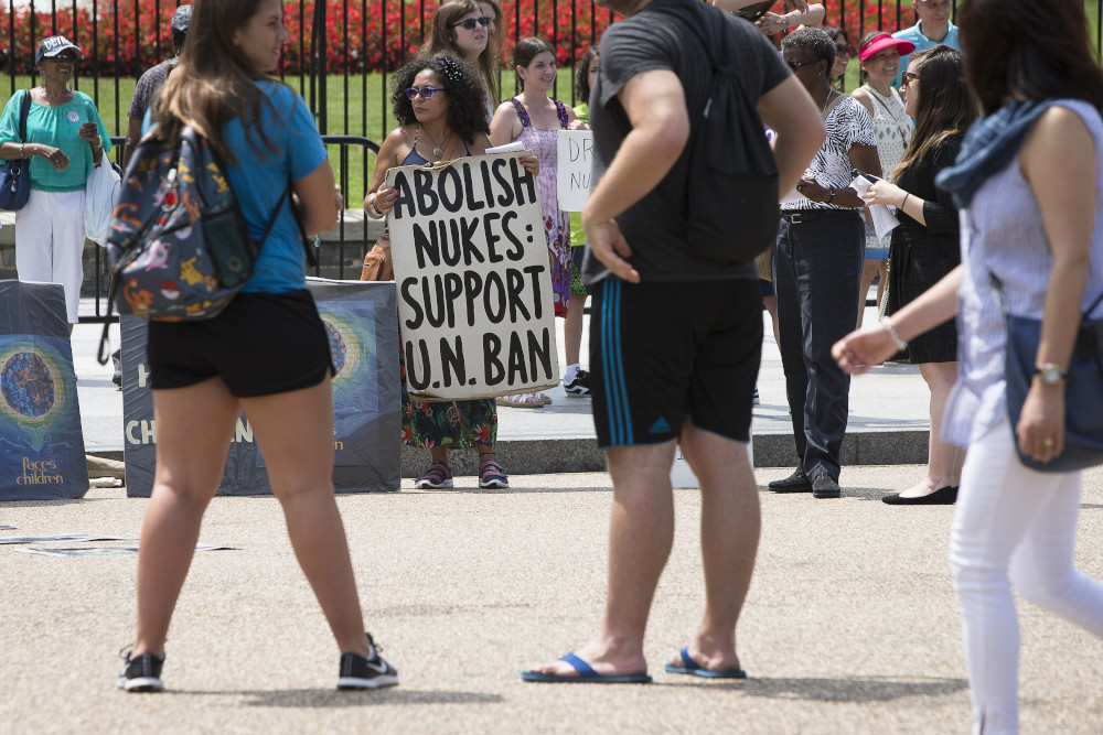 Peace activists hold a Catholic prayer service of repentance near the White House Aug. 9, 2018, for the use of nuclear weapons on Japan during World War II. (CNS/Tyler Orsburn)