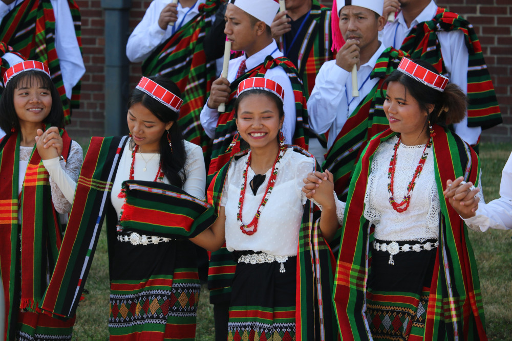 Women in traditional attire participate in a procession July 2, 2022, during the National Catholic Burmese-American Conference in Owensboro, Ky. (CNS photo/Riley Greif, The Western Kentucky Catholic)