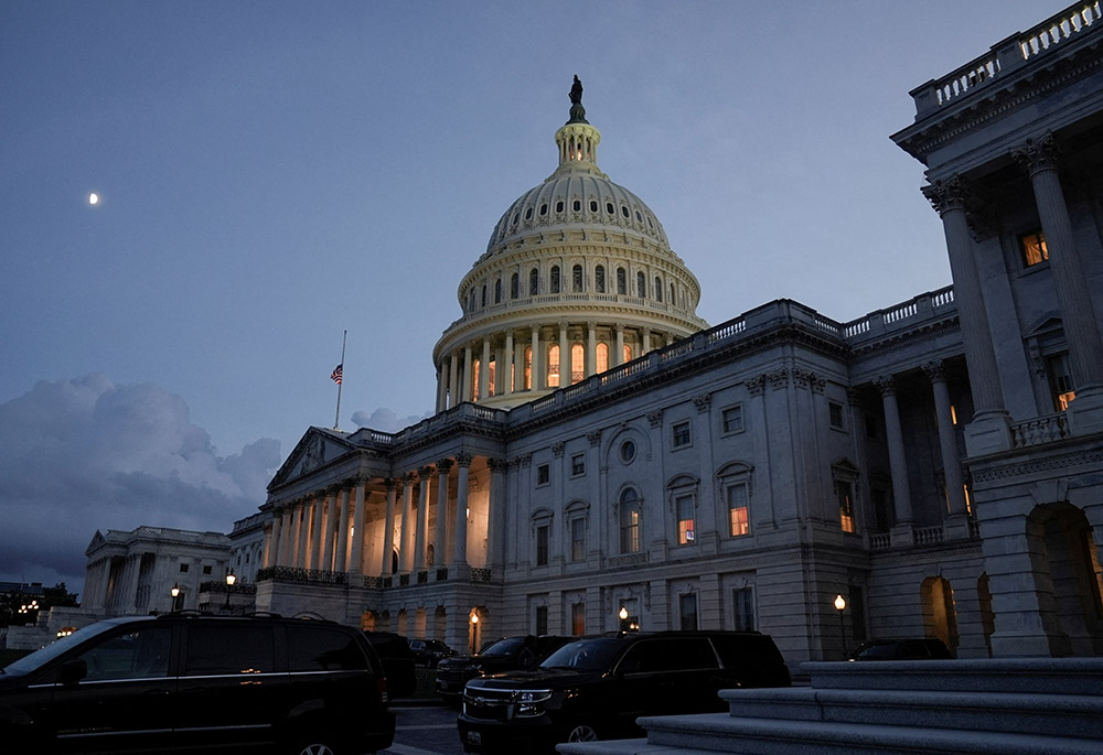 The U.S. Capitol is seen in Washington Aug. 6, after Vice President Kamala Harris voted on the Senate floor to break the 50-50 tie to proceed to consideration of the Inflation Reduction Act. (CNS/Reuters/Ken Cedeno)