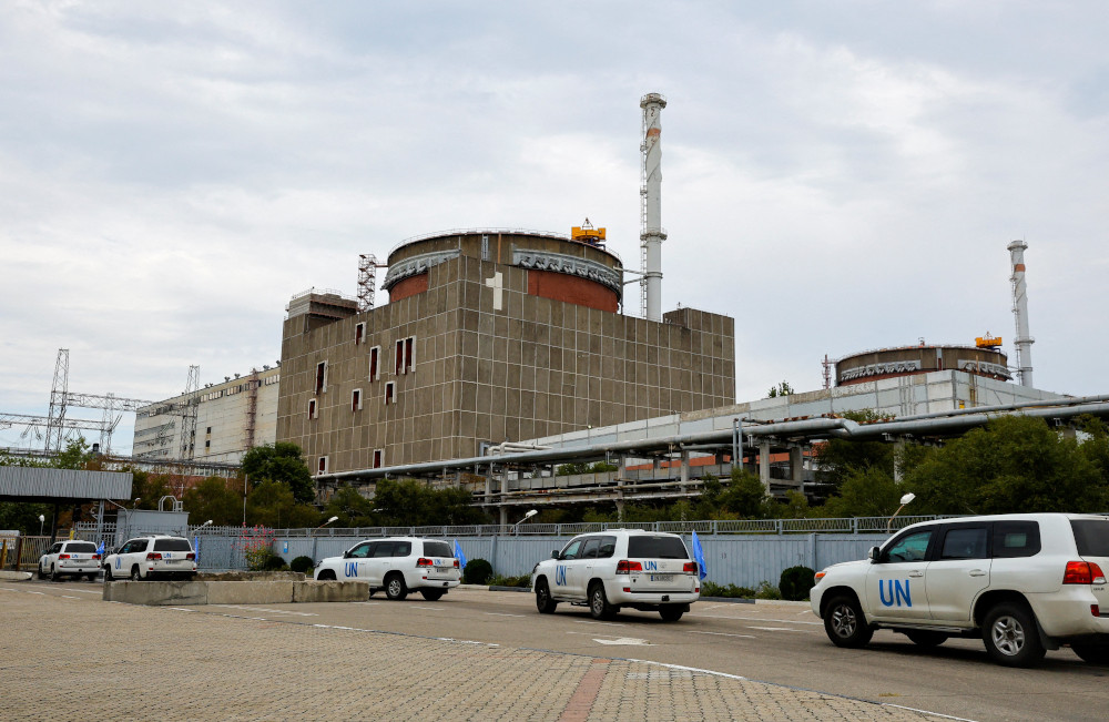 A motorcade transporting the International Atomic Energy Agency expert mission arrives at the Zaporizhzhia nuclear power plant in the course of Ukraine-Russia conflict outside the Russian-controlled city of Enerhodar in eastern Ukraine Sept. 1, 2022. 