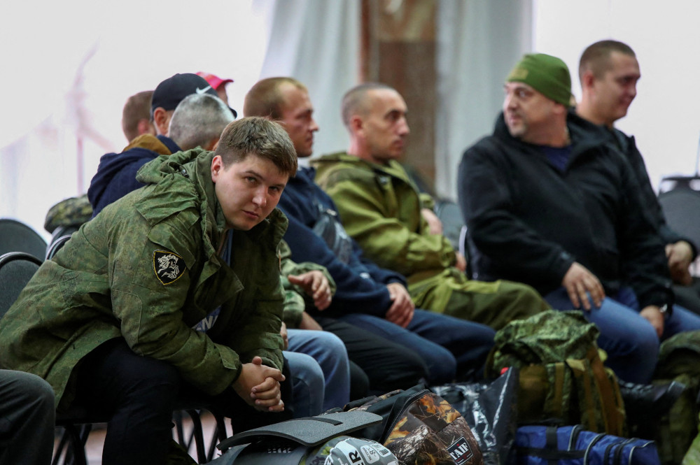 Russian reservists meet at a gathering point in the course of partial mobilization of troops in Volzhsky Sept. 28, 2022. (CNS photo/Reuters)