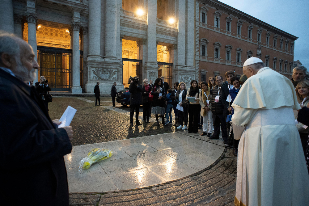 Pope Francis dedicates a plaque before celebrating Mass at the Basilica of St. John Lateran in Rome Nov. 11, 2019. (CNS photo/Vatican Media)