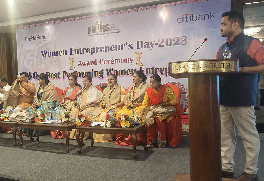 St. Joseph of Tarbes Srs. Irudaya Mary and Mariamma (fourth and third from right) during an award ceremony organized by the Functional Vocational Training and Research Society to honor women entrepreneurs in March 2023. (Thomas Scaria)