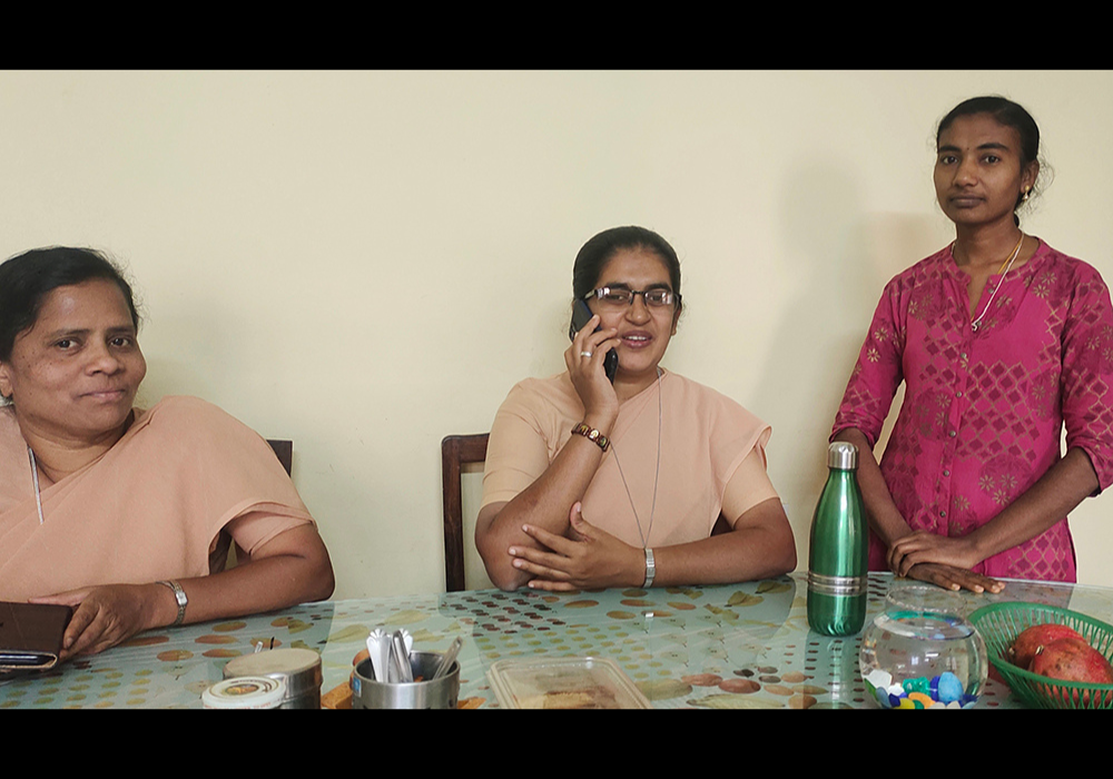 St. Joseph of Tarbes Sr. Irudaya Mary (left), and Sister Mariamma (center) with Priya Raj, a resident of Sangraha, a shelter home for destitute women and children in the southern Indian city of Bengaluru. (Thomas Scaria)