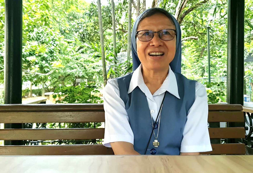 Pauline Sr. Pinky B. Barrientos speaks during an interview in an open cottage at Daughters of St. Paul's central house in Pasay City, Philippines. (GSR photo/Oliver Samson)