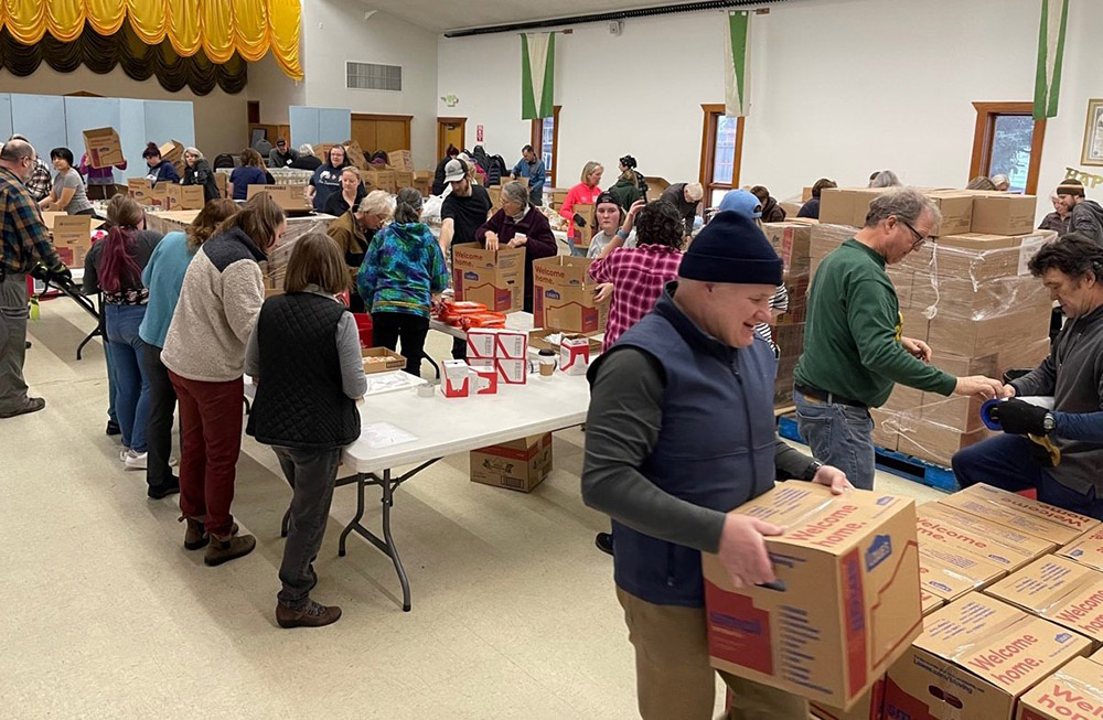 The Thanksgiving Blessing collection in Anchorage, Alaska, draws volunteers to help distribute food donations Nov. 21, 2022. The annual collaboration between local faith communities and the Food Bank of Alaska helps ensure families in the community have a holiday meal. (OSV News/Courtesy of Catholic Social Services)