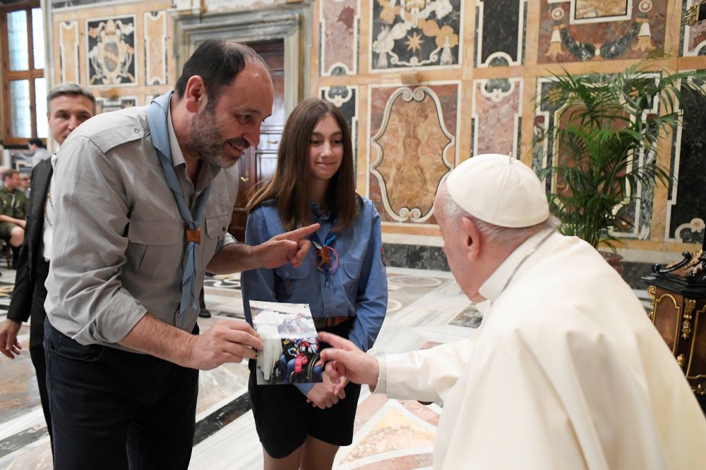 Pope Francis greets members of the Italian Catholic Movement of Adult Scouts during a meeting at the Vatican April 13, 2023. (CNS photo/Vatican Media)