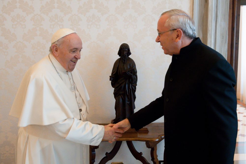 Pope Francis greets then-Jesuit Fr. Marko Rupnik during a private audience at the Vatican in this Jan. 3, 2022, file photo. 