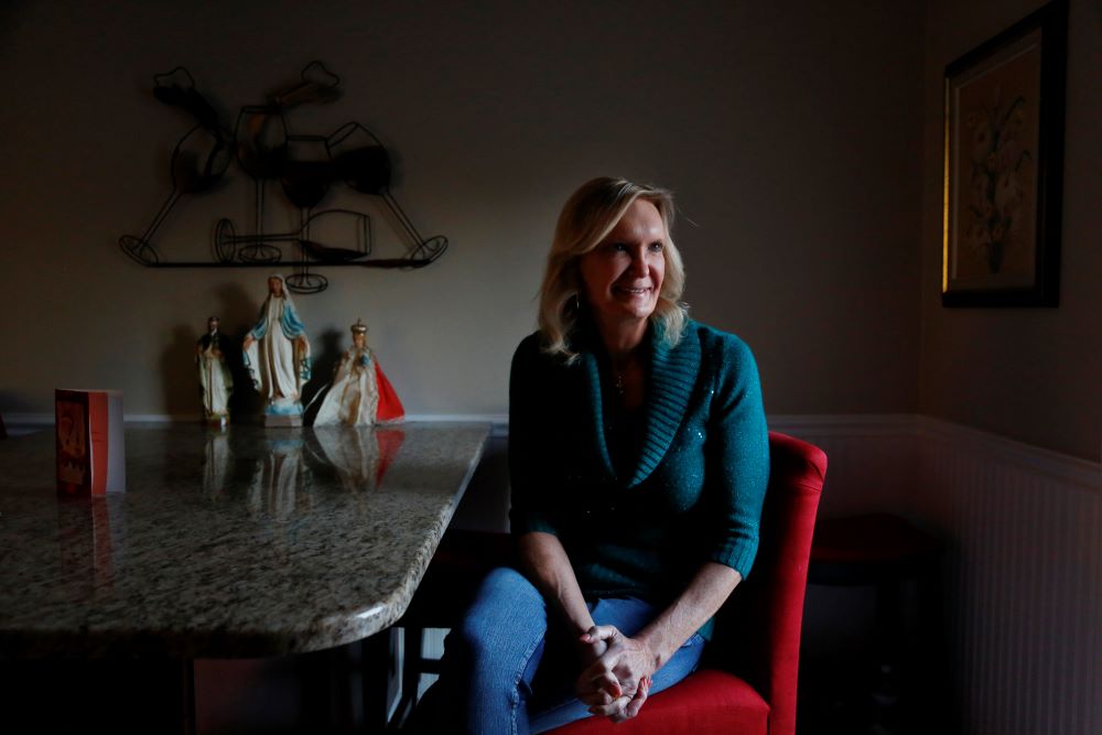 Christine Zuba poses for a portrait in her kitchen in Blackwood, New Jersey.