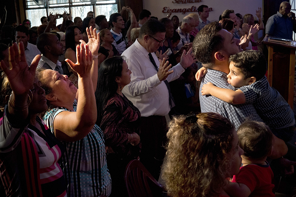 Evangelicals pray during a memorial service in Havana, Cuba, May 20, 2018. The 1959 revolution led by Fidel Castro installed an atheist, Communist government, but 65 years later practitioners of diverse religions gather to pray, sing and worship across the Communist-run island. (AP/Ramon Espinosa, File)