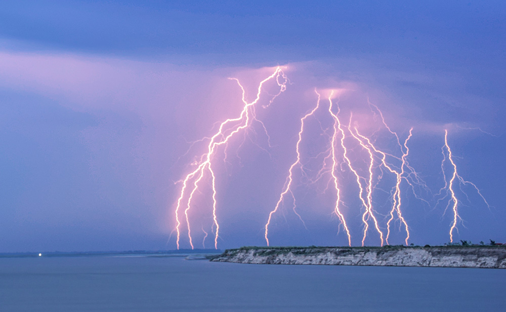 A thunderstorm is seen over the Jamuna River in Bangladesh. (Dreamstime/Rasel Ahmmed)