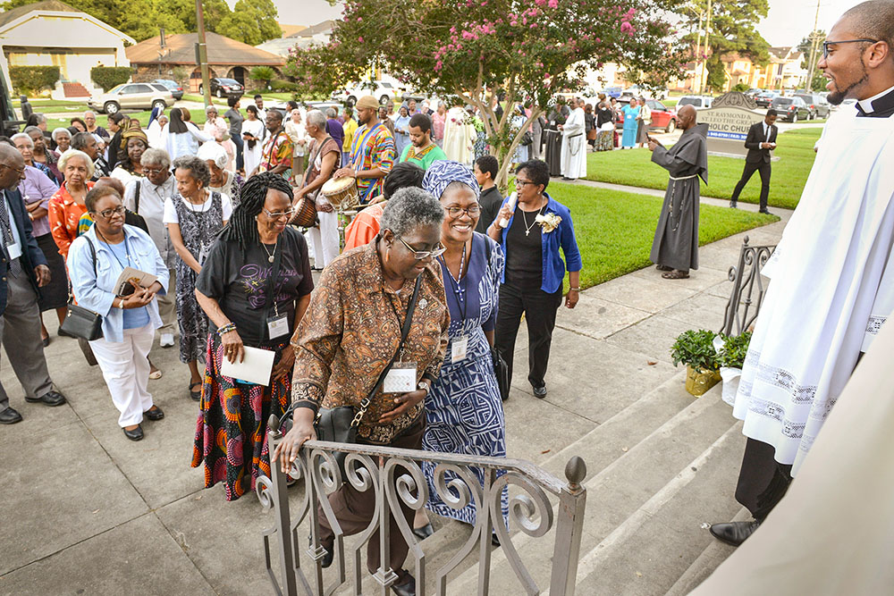 Women religious from the National Black Sisters Conference process into St. Raymond-St. Leo the Great Parish Church in New Orleans July 30, 2018. They gathered with members of the National Black Catholic Clergy Caucus, the National Black Catholic Seminarians Association and the National Association of Black Catholic Deacons for the opening Mass of the Joint Conference 2018. (CNS/Clarion Herald/Frank J. Methe)