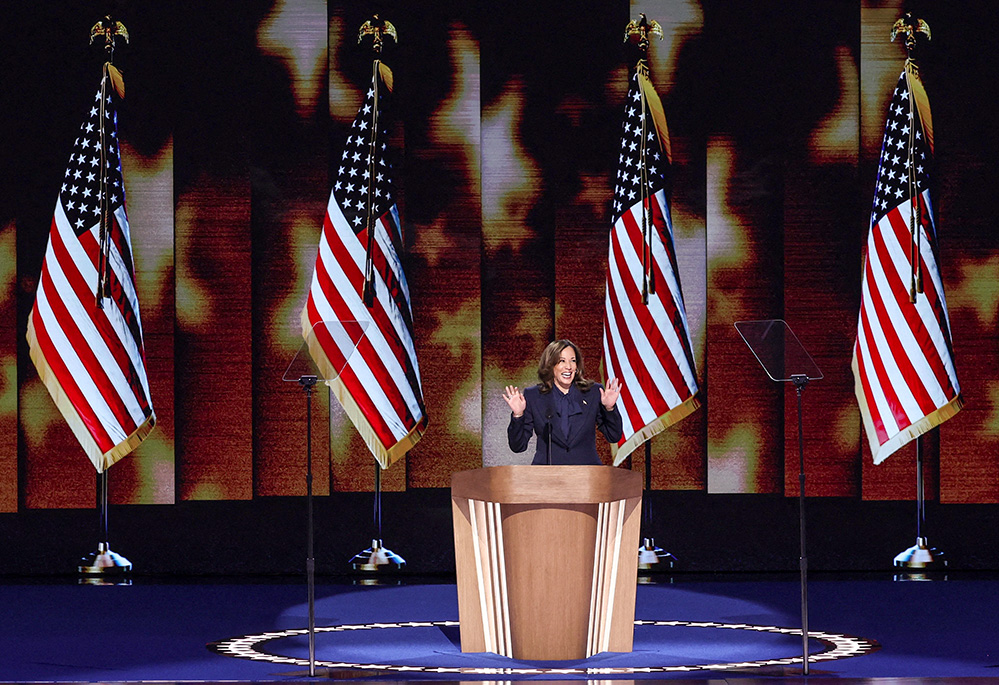 Democratic presidential nominee and U.S. Vice President Kamala Harris takes the stage during the Democratic National Convention at the United Center in Chicago Aug. 22. (OSV News/Reuters/Mike Segar)