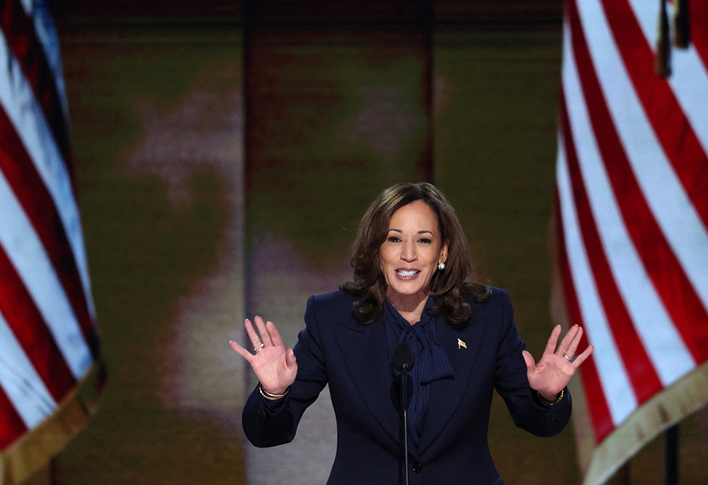 Democratic presidential nominee and U.S. Vice President Kamala Harris takes the stage during the Democratic National Convention at the United Center in Chicago on Aug. 22. (OSV News/Reuters/Mike Segar)