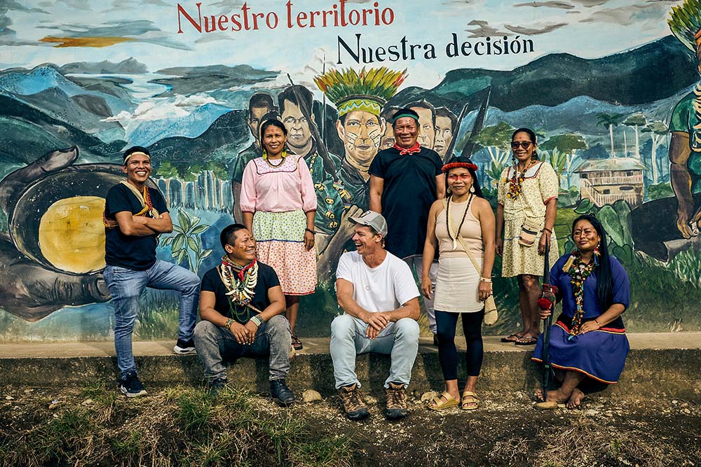 Amazon Frontlines co-founders (front row, center) Mitch Anderson and Nemonte Nenquimo, with partners from the Indigenous organization Ceibo Alliance (Courtesy of Amazon Frontlines)