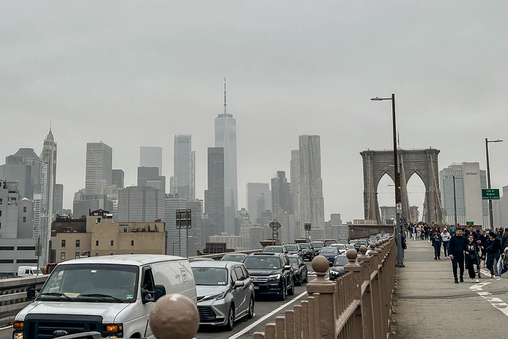 With Manhattan's Financial District in the background, vehicular and pedestrian traffic is seen on the Brooklyn Bridge in New York City on May 6. (Wikimedia Commons/MemeGod27)