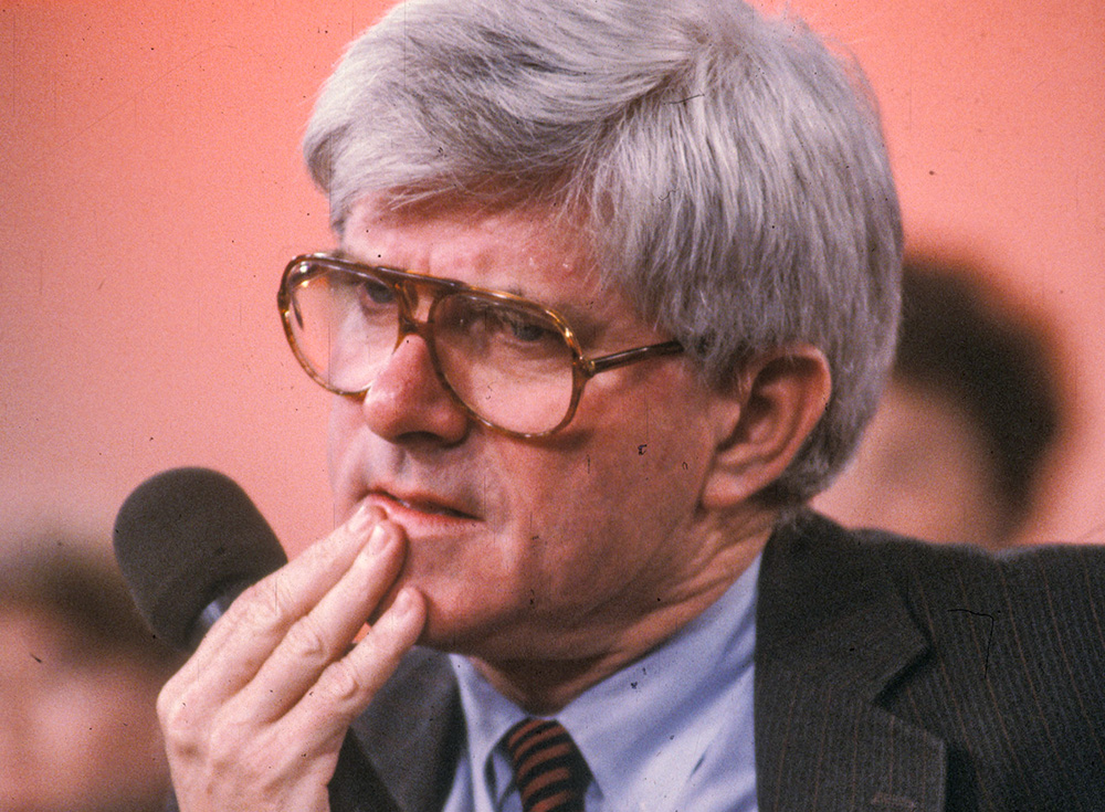 Phil Donahue listens on his television talk show in an undated photo. (Newscom/ZUMAPRESS.com/Al Stephenson)