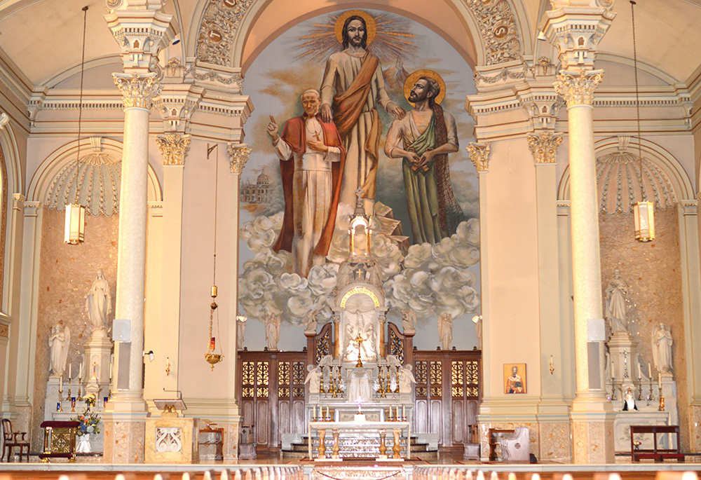 A mural is seen above the altar at St. Peter Catholic Church, Aug. 22 in Steubenville, Ohio. Fr. Bradley Greer, chancellor of the Diocese of Steubenville, and Fr. Timothy Huffman, parochial vicar at St. Peter, are seeking legal custody of a small child in an unusual case scheduled for a juvenile court hearing in October. (OSV News/Christopher Dacanay)