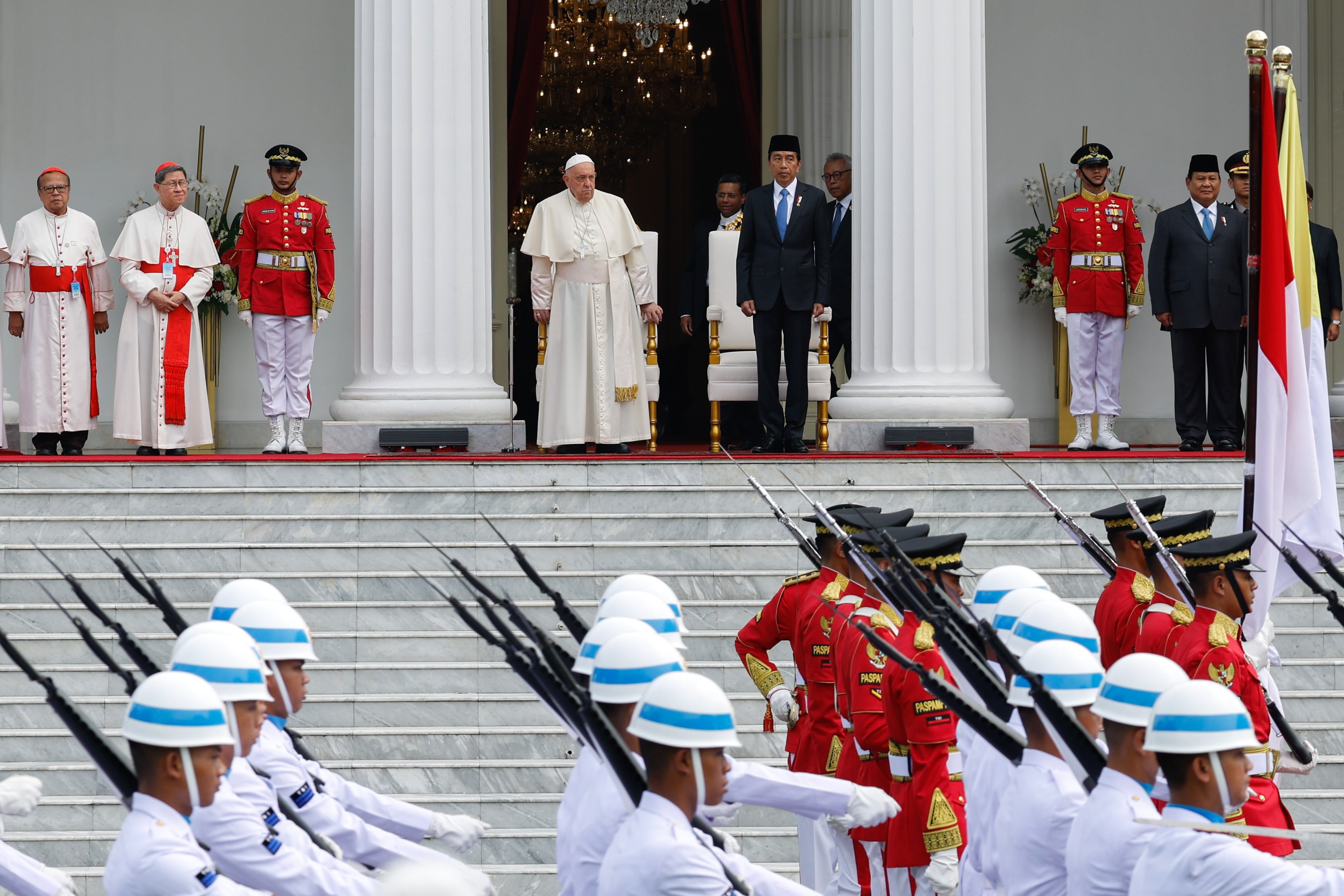 Pope Francis attends an official welcome ceremony with President Joko Widodo of Indonesia outside Merdeka Palace in Jakarta, Indonesia, on Sept. 4. (CNS/Lola Gomez)