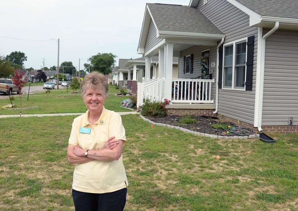 Benedictine Sr. Jane Michele McClure poses outside a St. Theresa Place house. 