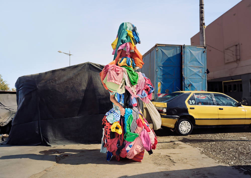 A creation of performance artist Jeremy Hutchison, the clothing "zombie" was seen walking around Manhattan during New York Fashion Week. The project aims to raise awareness about clothing waste in the fashion industry. (Dani Pujalte)