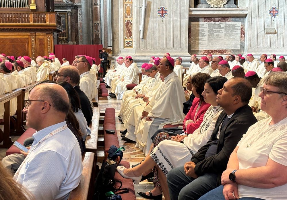 Synod delegates gather for Mass Oct. 9. 