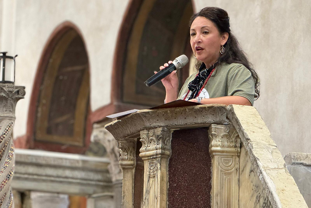 Jessica Morel, a U.S. military chaplain, offers a reflection Oct. 5, 2024, at the Basilica of Santa Maria in Cosmedin in Rome. Morell said the struggle for women and the diaconate has at times felt "abundant in hope, disappointment, rage, love, and connectedness," but she urged the group to continue. (NCR photo/Rhina Guidos)