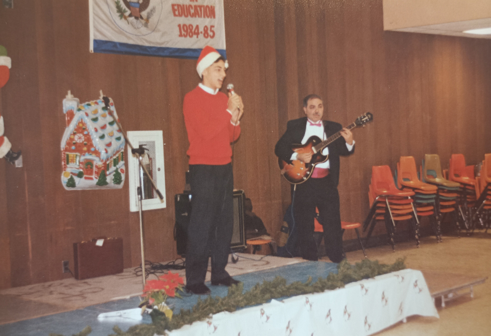 A teenage Matthew LaBanca performs Christmas carols with his father, Frank LaBanca, for a local Lions Club in 1992. (Courtesy of Matthew LaBanca)