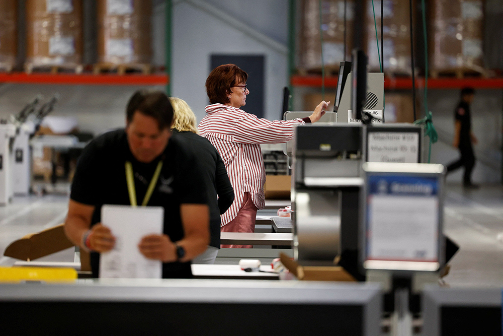 Election officials scan ballots in Philadelphia during the U.S. presidential election on Election Day, Nov. 5, 2024. (OSV News/Reuters/Rachel Wisniewski)