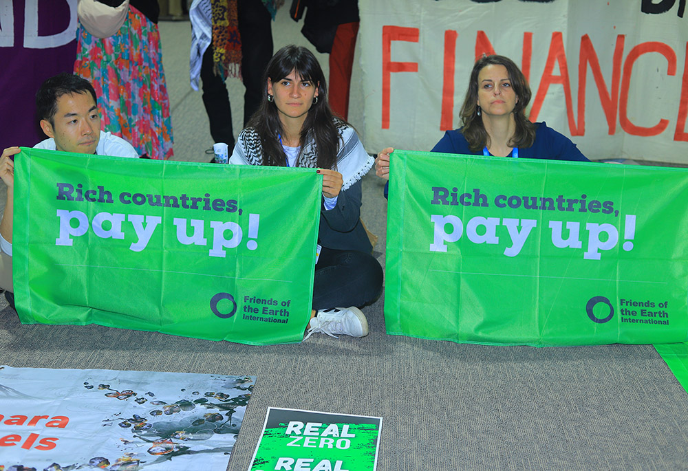 Climate activists demonstrate at the COP29 U.N. climate summit Nov. 16 in Baku, Azerbaijan. (NCR photo/Doreen Ajiambo)