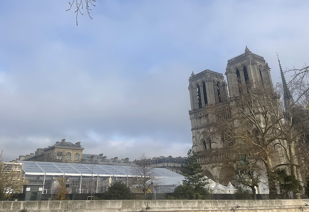 Notre Dame Cathedral is pictured Dec. 1 in Paris, still under construction ahead of its Dec. 8 inauguration Mass. The cathedral has been closed since the April 15, 2019, fire that nearly destroyed the 860-year-old landmark. (NCR photo/Christopher White)