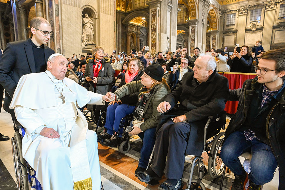 Pope Francis greets people at the conclusion of Mass in St. Peter's Basilica at the Vatican Jan. 1, 2025, the feast of Mary, Mother of God, and World Peace Day. (CNS/Vatican Media)