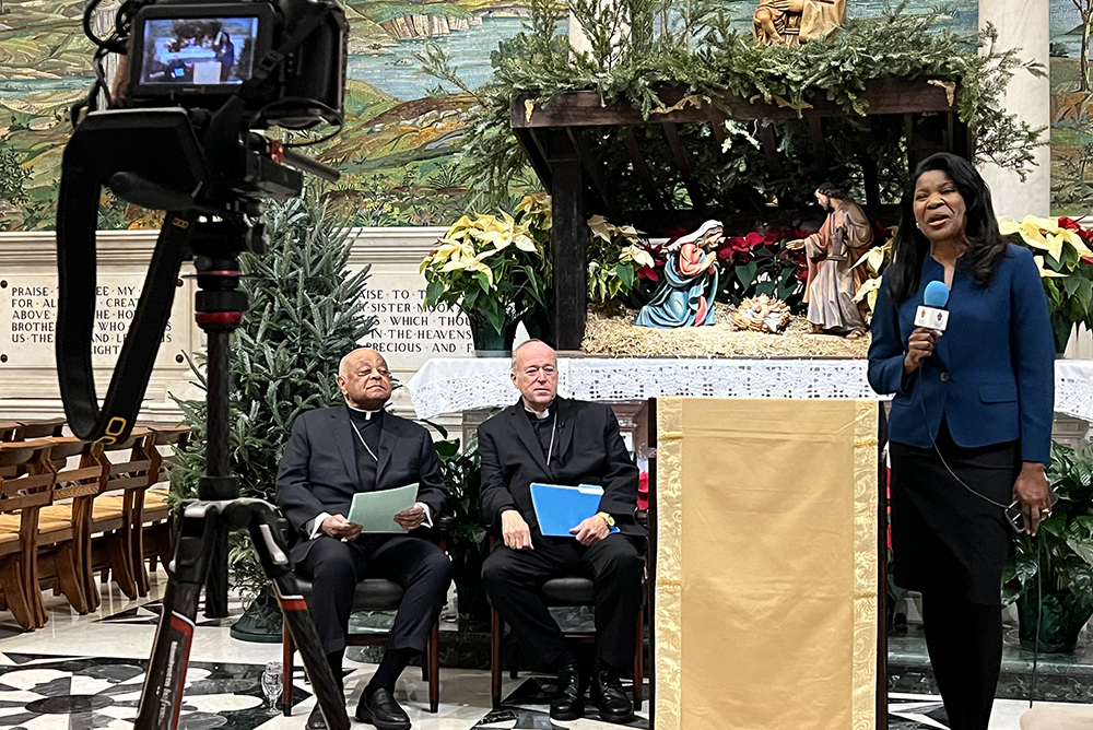 Paula Gwynn Grant, communications secretary for the Archdiocese of Washington, speaks at the beginning of a Jan. 6, 2025, press conference at the Cathedral of St. Matthew the Apostle in Washington, where Cardinal Wilton Gregory, at left, and Cardinal Robert McElroy, center, spoke. (OSV News/Archdiocese of Washington/Geoffrey Ros)