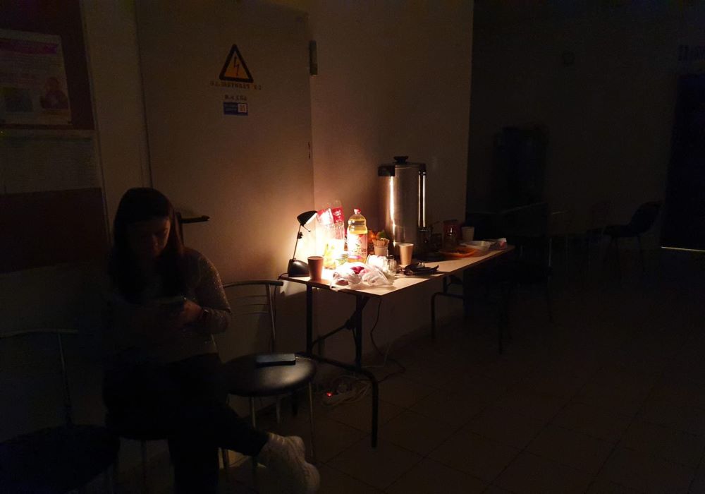 A displaced Ukrainian woman shelters in a Kyiv church basement Feb. 26 after Russia invaded her country. (CNS/Courtesy Polish Bishops' Conference)