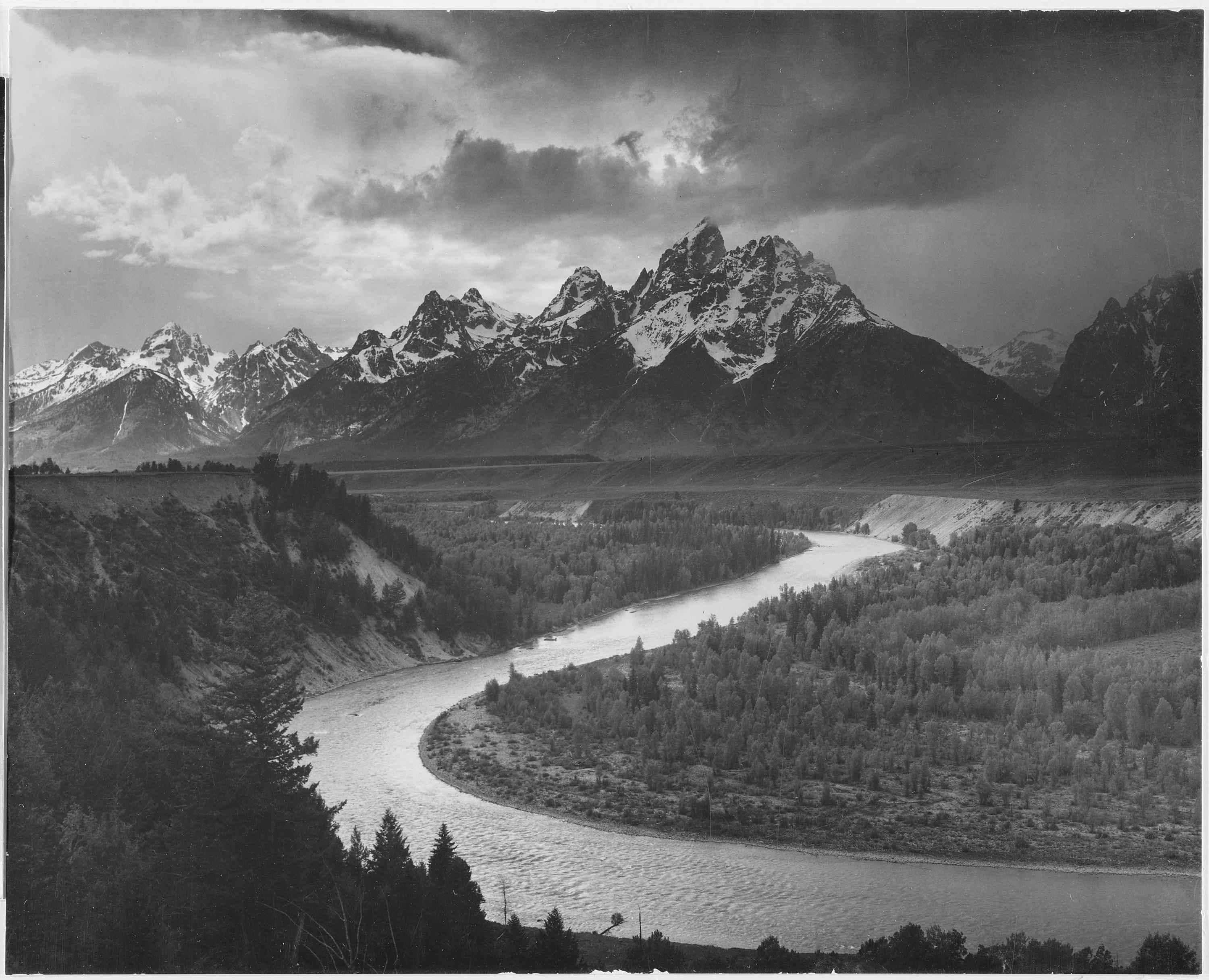 river with mountain range in the back ground