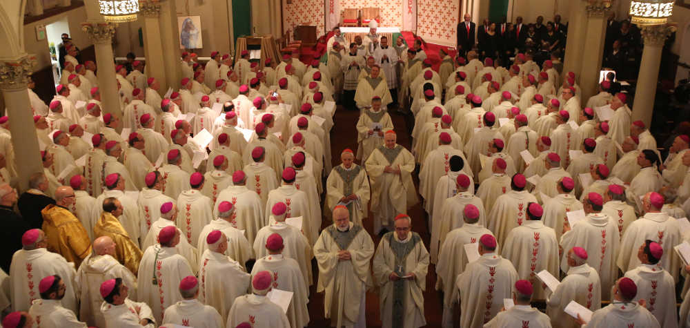 Bishops and altar servers process out after Mass at St. Peter Claver Church in Baltimore last year during the annual fall general assembly of the U.S. Catholic Bishops. (CNS/Bob Roller)