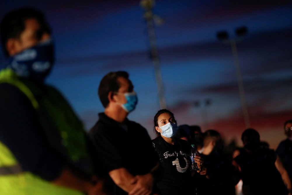 Latino voters in the Maryvale neighborhood of Phoenix line up at a polling station to vote in the presidential election Nov. 3, 2020. (CNS/Reuters/Edgard Garrido)